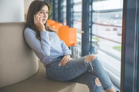 Listening to interlocutor on mobile Stock Photos