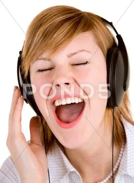 Listening to music with headphones Stock Photos