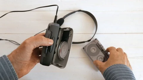 Listening to the old walkman Stock Footage 108136373