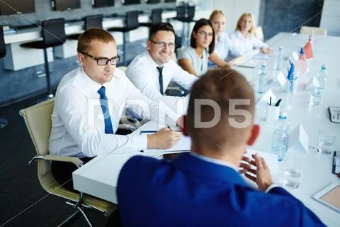 Listening to spokesman Stock Photos