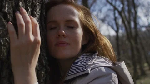 Listening to a tree Stock Footage 138166307