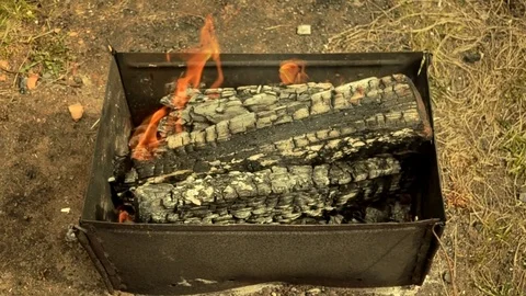 Lit a bonfire in the grill 動画素材 74867483
