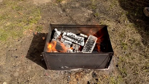 Lit a bonfire in the grill 動画素材 74867760