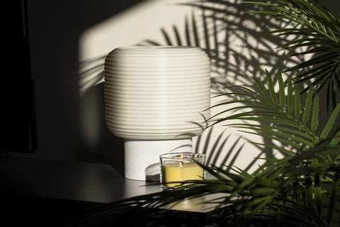 Lit Candle and Table Lamp Foto stock
