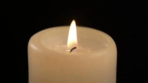 Lit Candle on Black Background 스톡 동영상 130419043