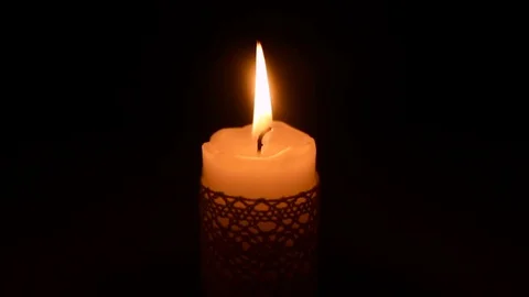 Lit candle in the dark Stock Footage 71826614