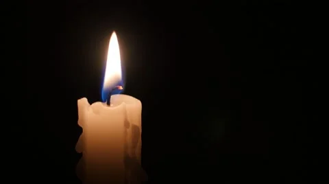 Lit candle in the dark room Stock Footage 47262666