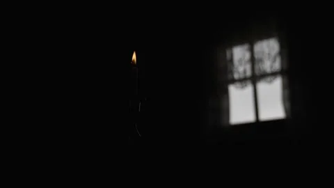 Lit Candle in a Dark Room Stock-Footage 300491229