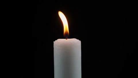 Lit candle isolated black background Stock Footage 278958545