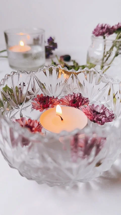 Lit candle as it floats gracefully in water Stock Footage 271606958