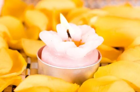 A lit candle Stock Photos