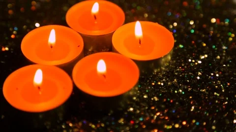 The lit candles against the background of gloss in degradation Stock Footage 83138775