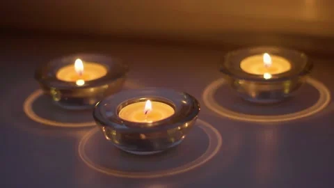 Lit candles with nice blurred background Stock Footage 225283793