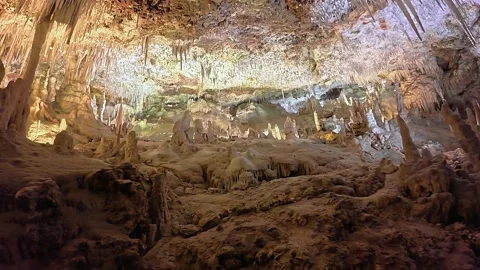 Lit cave ceiling with mineral formations in Mallorca Vídeos de archivo 334399419