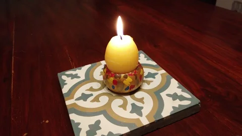 A lit egg and traditional sweets to wish everyone happy Easter Stock Footage 128158766