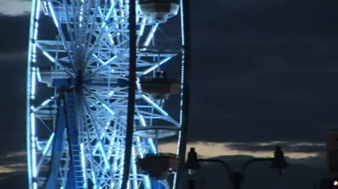 Lit up Ferris Wheel at night Stock Footage 8912240