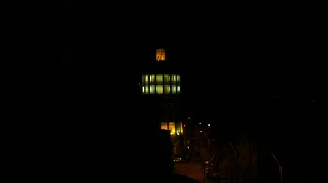 Lit Fire Tower Late At Night In Downtown Bucharest, Landmark, Pan and Tilt Stock-Footage 49321604