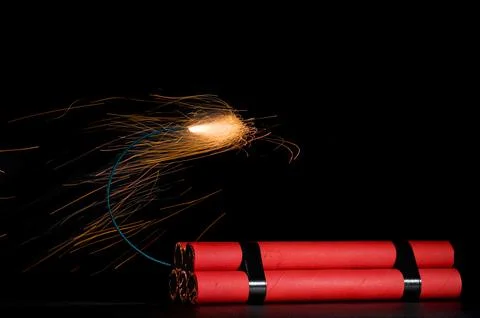 A lit fuse of a bundle of dynamite Foto stock