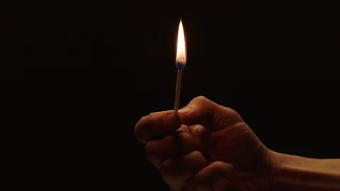Lit match in the dark Stock Footage 103368204