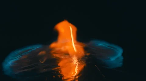 A lit match is fall down and ignites the petrol. Slow mo, slo mo Stock Footage 64716236