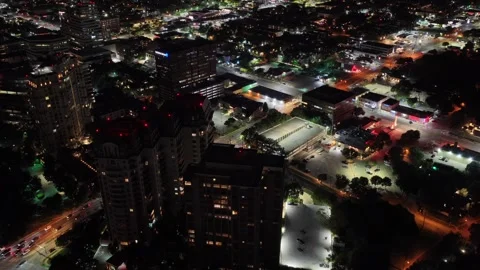 Lit Parking Fields and Low Retail in a Dallas Commercial District Stock Footage 343073490