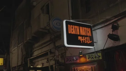 Lit up sign death match in hell in apocalyptic setting Stock Footage 224586644