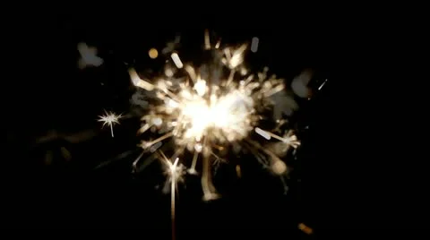 Lit Sparkler Over Black Background, 1080p Video stock 12688982