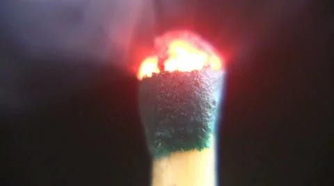 A lit wooden match burning Stock Footage 54128043