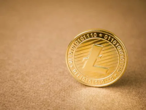 Litecoin on a brown background. Stock Photos