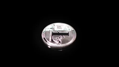 Litecoin crypto coin rotating clockwise Stock Footage 124907852