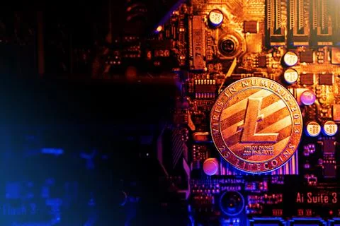 Litecoin Cryptocurrency coin on a PC computer motherboard, crypto currency mi Stock Photos