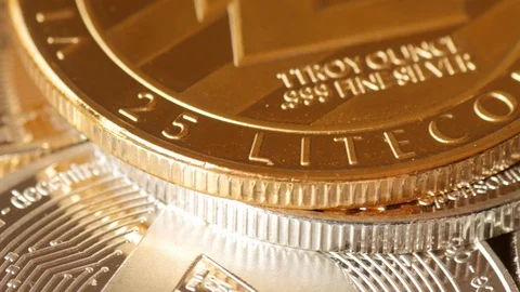 Litecoin cryptocurrency coin rotating, macro Stock Footage 88424515