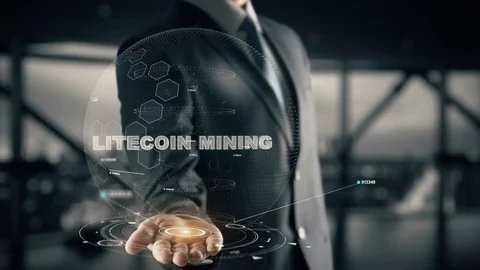 Litecoin Mining with hologram businessman concept Stock Footage