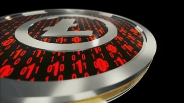 Litecoin symbol, close up view of silver cryptocurrency coin with binary code Stock Footage 86141482