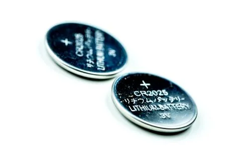 Lithium button cell battery isolated on white Stock Photos