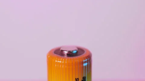 Lithium ion battery rotates close up Stock Footage 187037944