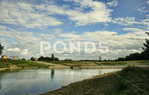 Lithuania lake with interesting clouds, Great Place to visit in Nature. Stock Photos