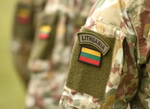 Lithuania patch flag on soldiers arm. Lithuanian military uniform. Lithuania Fotos de archivo