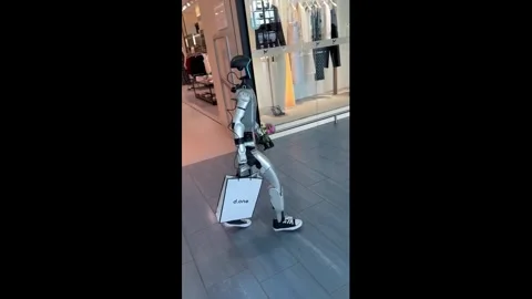 Lithuania: Robot walks through shopping mall for first time in Kaunas, Li... Stock Footage 334175938