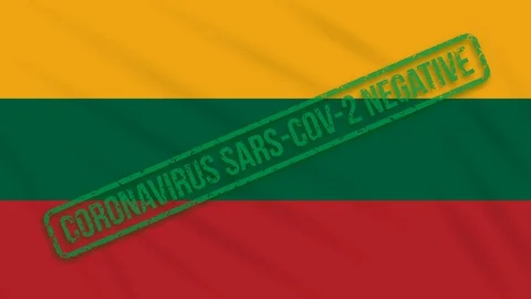 Lithuania swaying flag with a green stamp of freedom from coronavirus, loop Stock Footage 128024164
