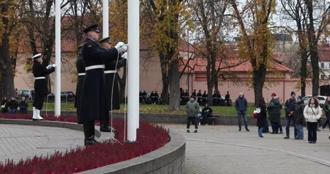 Lithuanian honor guards raising flags during autumn ceremony Stock Footage 321050134
