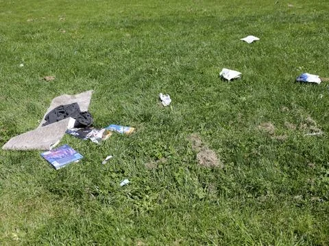 Littered Trash on Grass Stock Photos