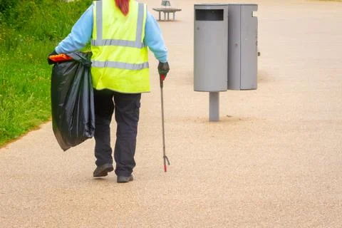 Litterpicker working to keep streets clean Stock Photos