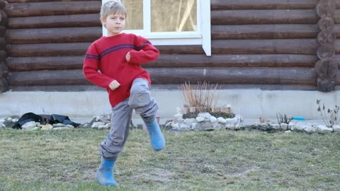 Little 6 years old kid boy practicing punches, karate, taekwondo movements at Stock Footage 333474700