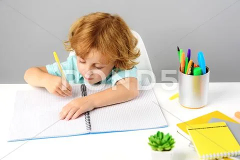 Little artist and his workplace at home Stock Photos
