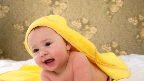 Little baby after bathing in a towel. Selective focus. Stock Footage 151863553