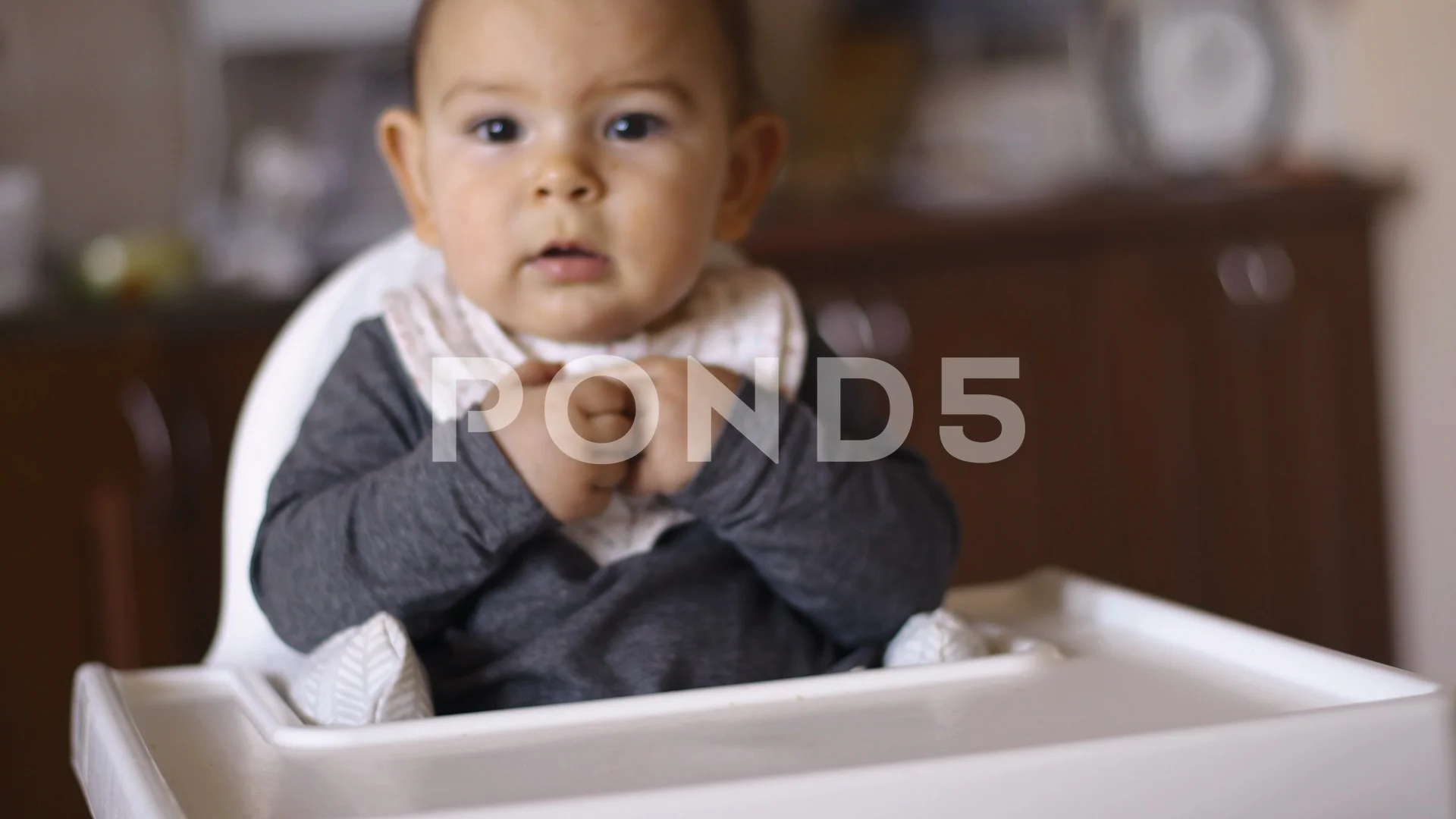 Little baby boy girl highchair cry smile emotions mother calm down