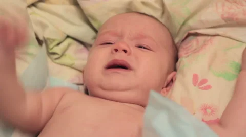 Little baby crying on the bed Video stock 68068686