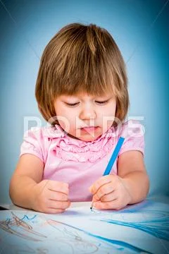 Little baby girl draws pencil Stock Photos