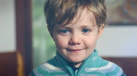 Little baby looking confused, tired, smile with mouth closed Stock Footage 59594377